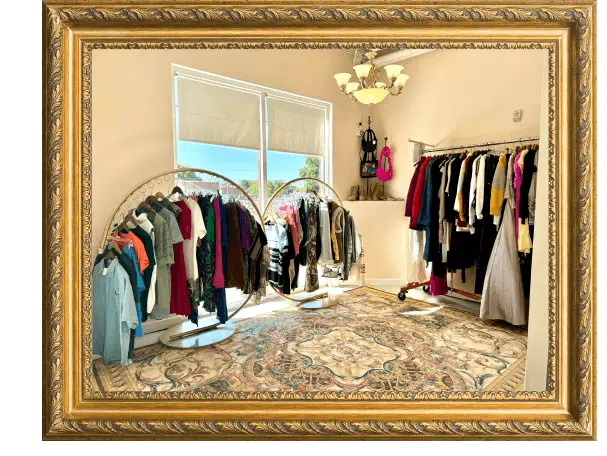 Clothing on racks inside Curveture Store